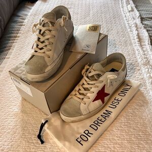Golden Goose sneakers. White and red with gray distressed.